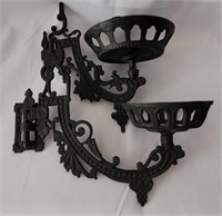TWO CAST IRON OIL LAMP HOLDERS