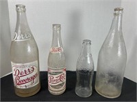 4 Vintage bottles. Derrs Beverages 32 oz