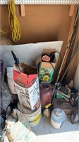 Corner lot that includes a toolbox, UGGs of oil,