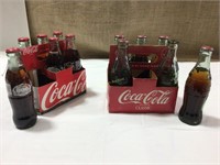 Coca Cola glass bottles sets.
