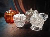 2 glass pumpkin dishes one orange and one clear