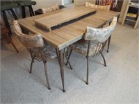 Vintage table with (4) Chairs and a leaf. Table