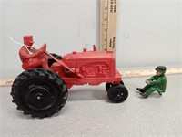 Rubber Tractor Auburn 572, and cast iron guy.