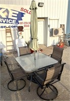 Patio table and swivel chairs some ware