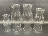 Four Clear Glass Hurricane Lamps