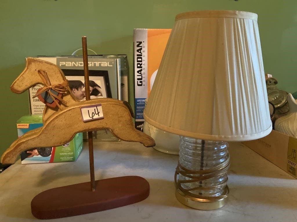 Wooden horse and small lamp