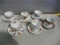 Six fancy cups & saucers