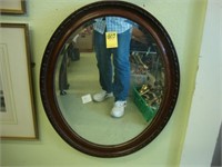 Late Victorian oval beveled wall mirror with faux