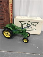 John Deere Model "BW-40" toy tractor, 8" long
