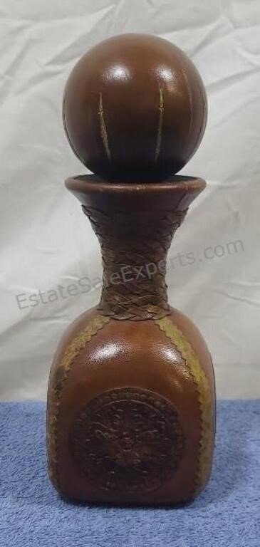 Leather covered glass decanter.  Made in Italy.