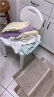Bath chair, towels, floor mats