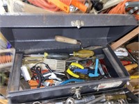 assorted tools including pliers and tape measures