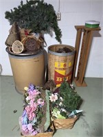 Barrels of pine cones and garland