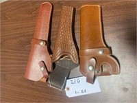 THREE LEATHER HOLSTERS