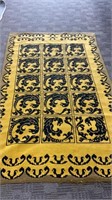 Woven burlap backed rug, 51x81, gold and black