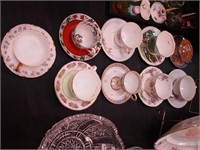 Nine cups and saucers: Haviland, Aynsley
