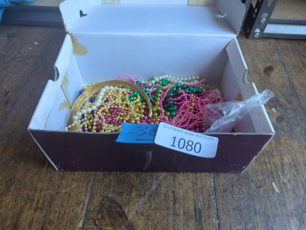 Shoe box with miscellaneous bead necklaces