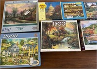 703 - LOT OF 7 PUZZLES