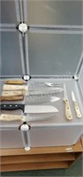 Box of assorted kitchen knives and one meat pork