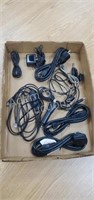 Box of assorted power cords, charging cords
