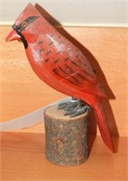 Hand carved Cardinal sculpture on pedestal