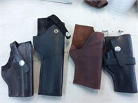 Four miscellaneous leather holsters