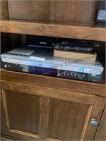 Samsung DVD player and Polaroid vcr and dvd