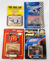 (4) RACING CARS WITH CARDS NEW IN BOX