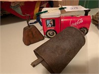 COLA TIN AND 2 ANTIQUE COW BELLS