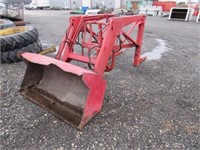 Ford loader with bucket and loader valve