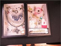 Two containers of costume jewelry: Paparazzi