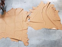 Pair of tan leather hides