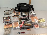 Survival gear, fire starter, ponchos, bag, and