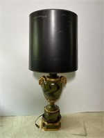 Table lamp with ram head handles