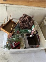 tote of xmas decor, pine cones