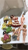 Assorted dolls and parts