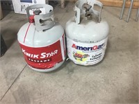 Two propane tanks - one empty one full
