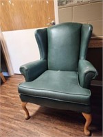 Green Vinal Wing Back Chair with Rip in Seat