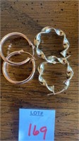 2 pair pierced hoop earrings.  One pairmarked 14