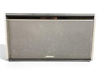 Powered on Bose Soundlink Bluetooth mobile speaker