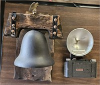 Table Lot Of A Wooden Base Cast Iron Dinner Bell