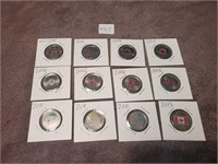 12x Special coloured  Canadian quarters