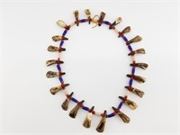 Buffalo tooth and trade bead necklace