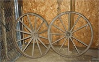 2 wooden spoke wheels, one spoke missing