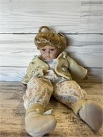 Soft doll with porcelin head, hands, feet