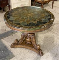 Beautiful round accent table with carved pedestal