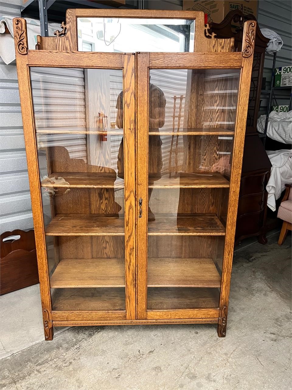 Antique wood and glass display cabinet w/mirror