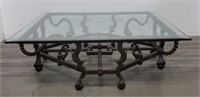 Heavy wrought iron table with thick glass top