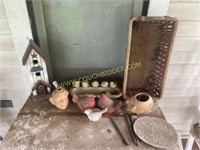 Assorted outdoor decor, birdhouse, and basket