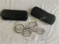 2 pair of antique eye glasses
